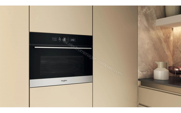 WHIRLPOOL WMW57DHMX - Appareil encastr&eacute; vue de 3/4 gauche